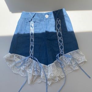 Blue shorts with lace bottom and adjustable ties